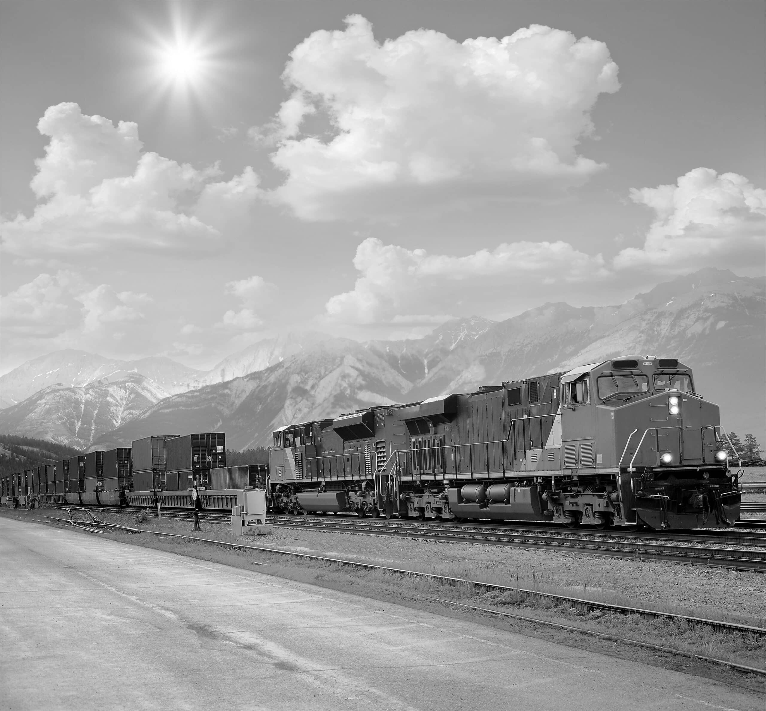 Freight train with mountains in the background.