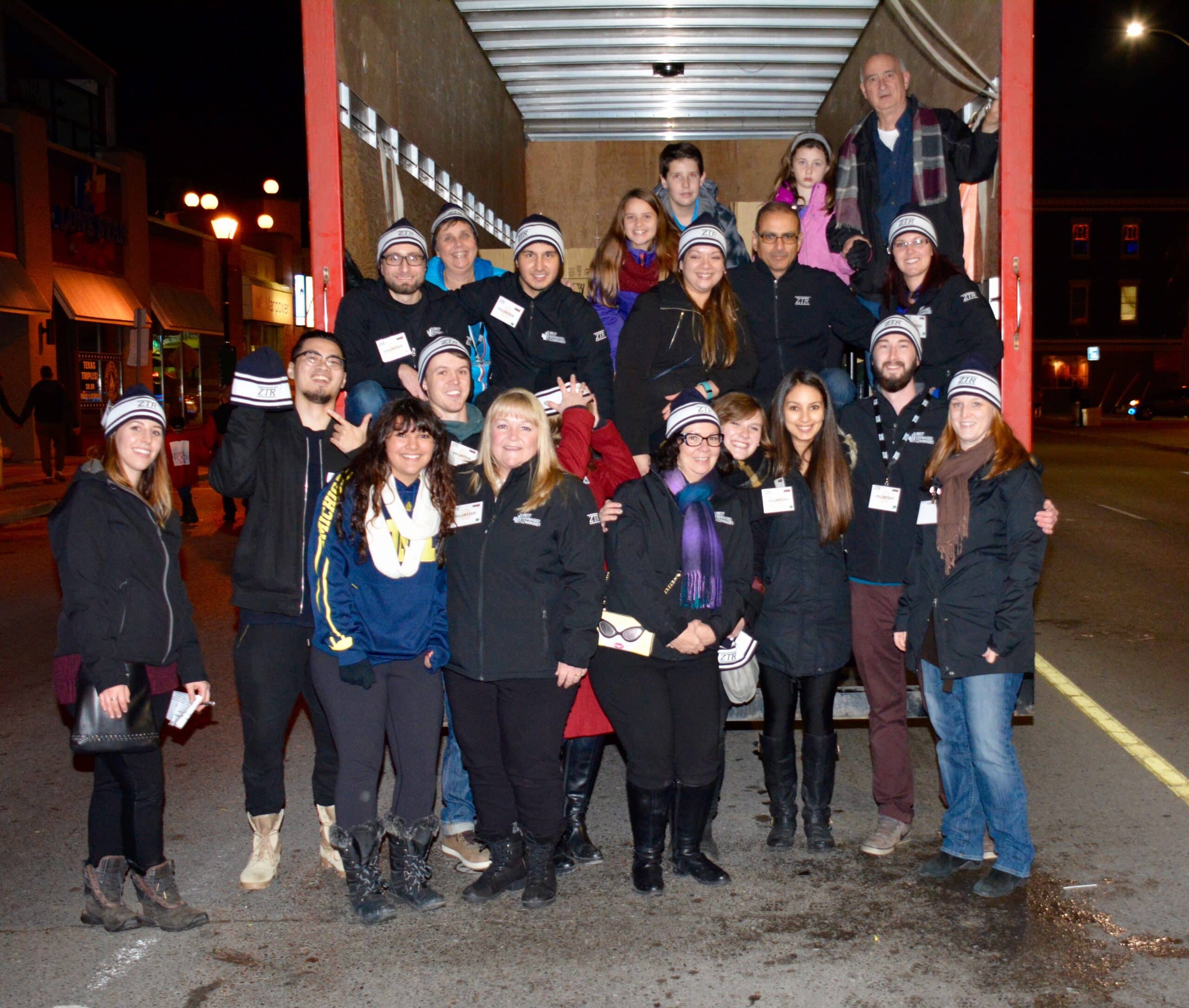 Group of people at an evening outdoor event.